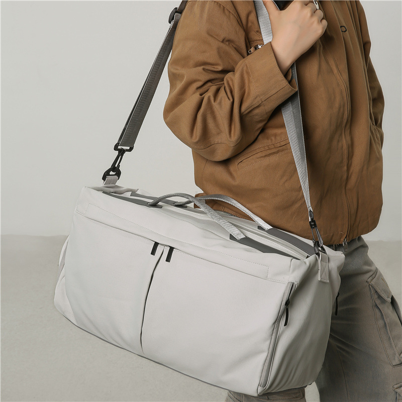 Bolsa de viaje corto con almacenamiento de zapatos independiente, bolsa de ejercicio de gran capacidad de separación seca y húmeda, nueva bolsa de equipaje de otoño y invierno