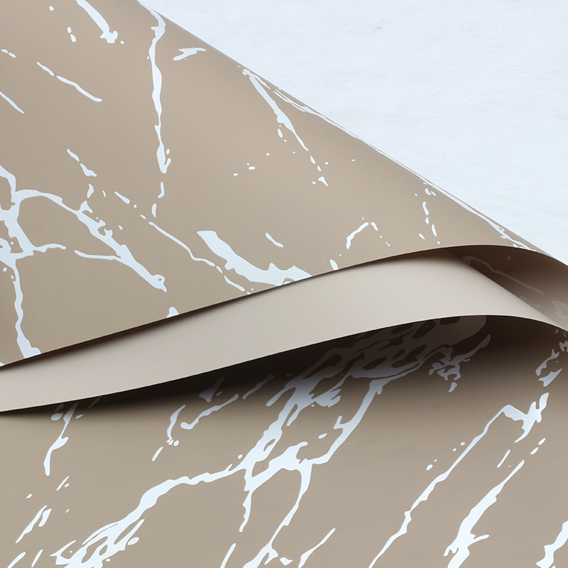 Huaxi Ouya Paper Mármol Papel de embalaje de flores Impresión engrosado Papel de flores impermeable Florería Ramo de flores Embalaje floral