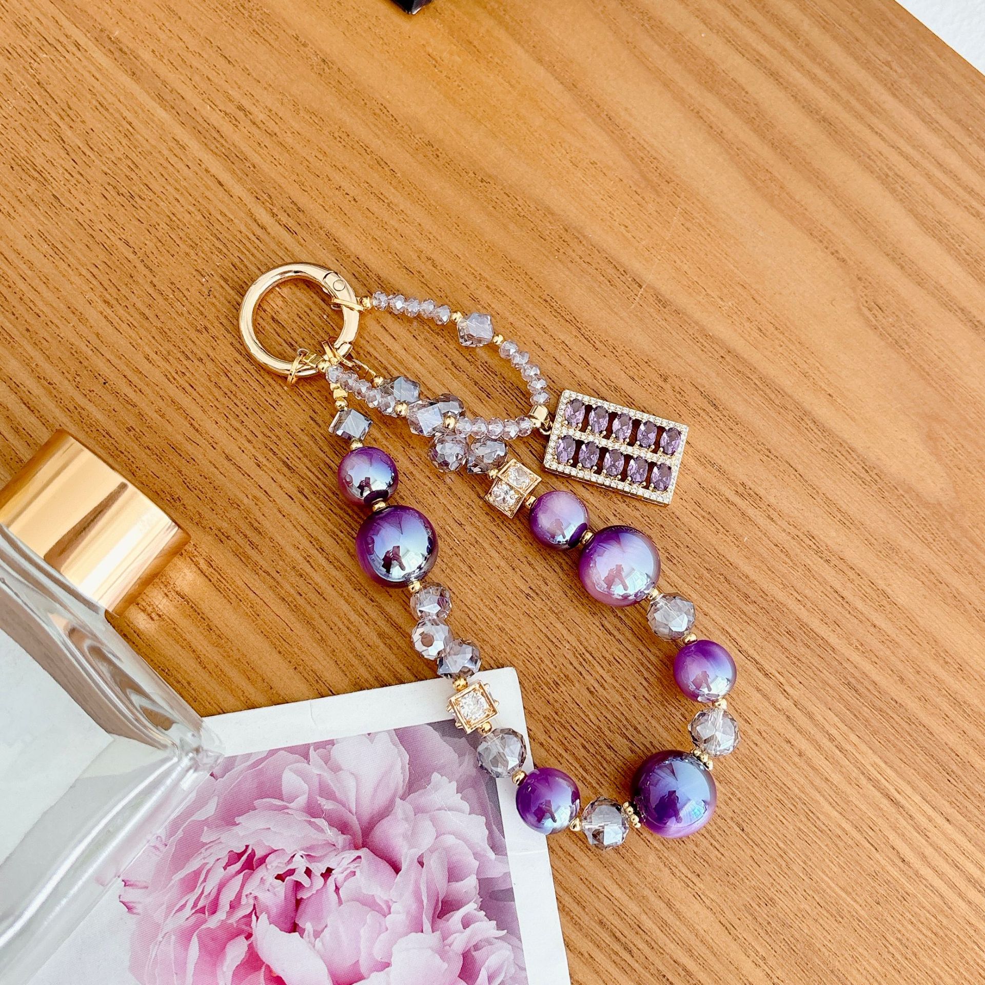 Alta sensación de lujo ligero zircon abaco serie de cadena de teléfono móvil cadena de teléfono móvil bolso llavero colgante nicho diseño