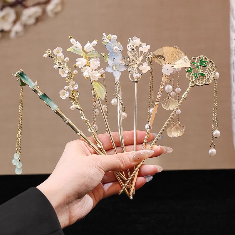 Nueva horquilla china 2025 nuevo estilo estilo antiguo horquilla mujer falda de cara de caballo de alta calidad estilo nacional horquilla de madera paso a paso horquilla tocado