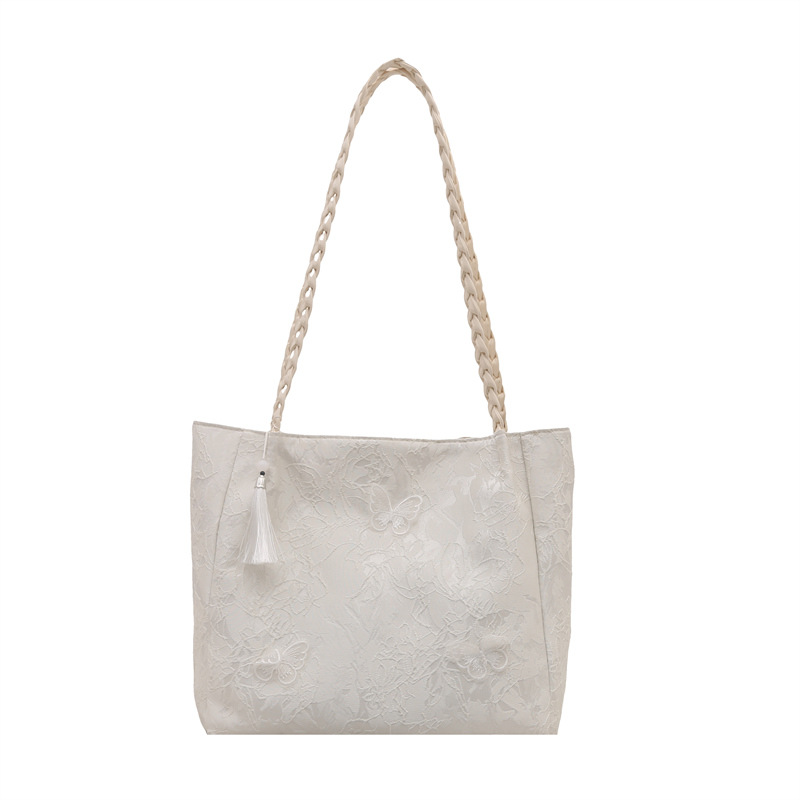Bolso de viaje de seda de mariposa de alta calidad de nicho 2025 verano nuevo bolso de mujer simple de gran capacidad nuevo estilo chino