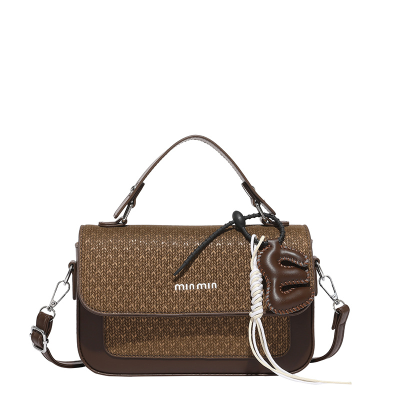 Textura al por mayor de lujo ligero bolso de mano bolso de mujer otoño 2025 nuevo estilo extranjero empalme bolso de hombro bolso de viaje