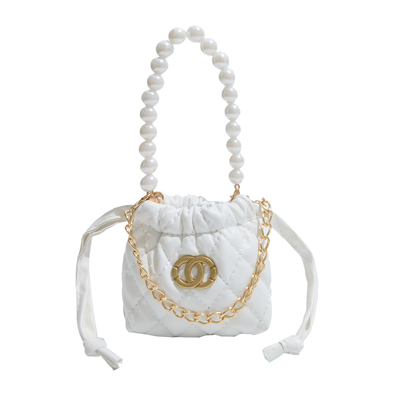 2026 nuevo niño cadena de perlas bolsos de diamante chicas moda mini bolsos de hombro caramelo princesa mochila