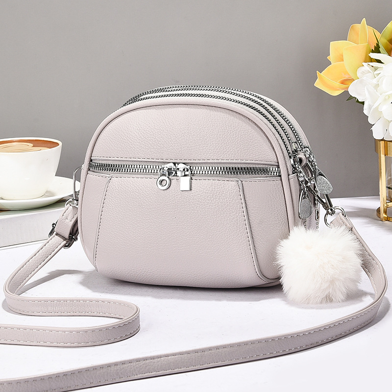 Versión coreana de varios compartimentos de alta calidad para damas bolso cuadrado pequeño bolso de hombro de moda de verano 2025 nuevo bolso de mensajero de todo fósforo