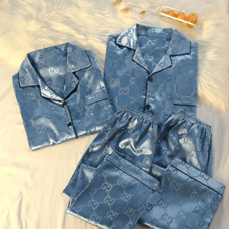 Los pijamas de primavera y otoño usan un hombre y una mujer Pantalones de manga larga de seda de hielo 2024 nuevas rayas más tamaño ropa para el hogar verano