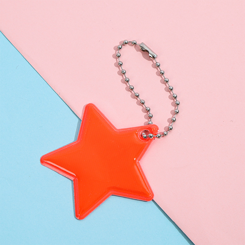 Llavero Colgante Reflectante de Estrella de PVC para Mochila Escolar y Ciclismo