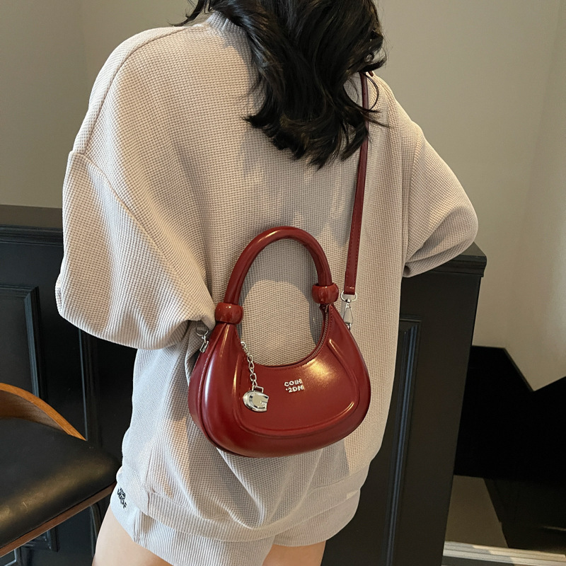 Bolsos de diseño de nicho de tendencia transfronteriza para mujer 2025 nuevo bolso de hombro retro salvaje bolso de axila de moda occidental