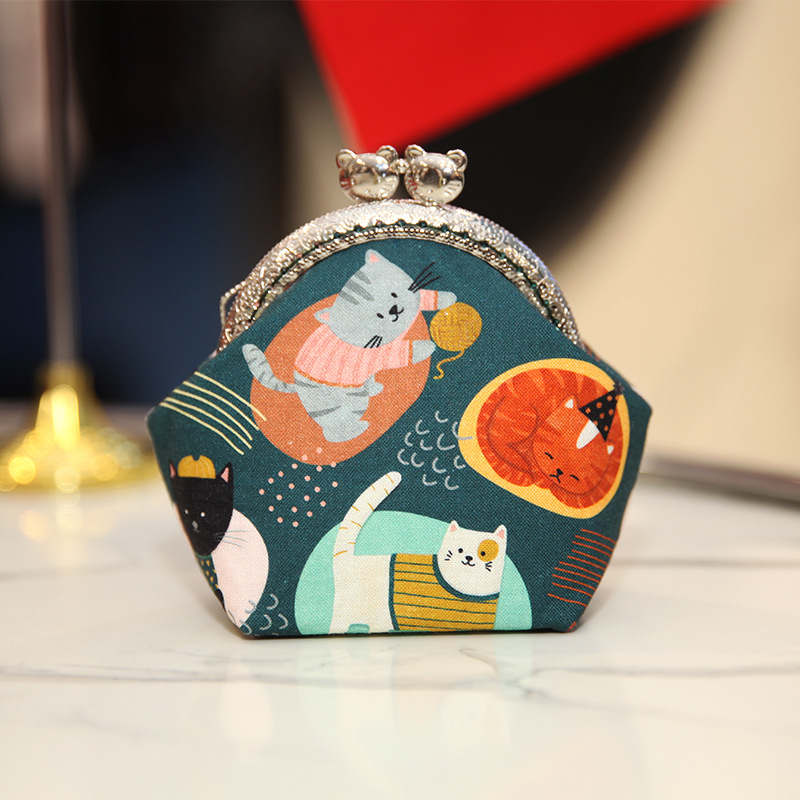 Bolsa de material de bordado bricolaje hecho a mano 8,5 boca Bolsa de Oro patchwork bolsa antigua bolsa transfronteriza inglés gato bolsa de almacenamiento