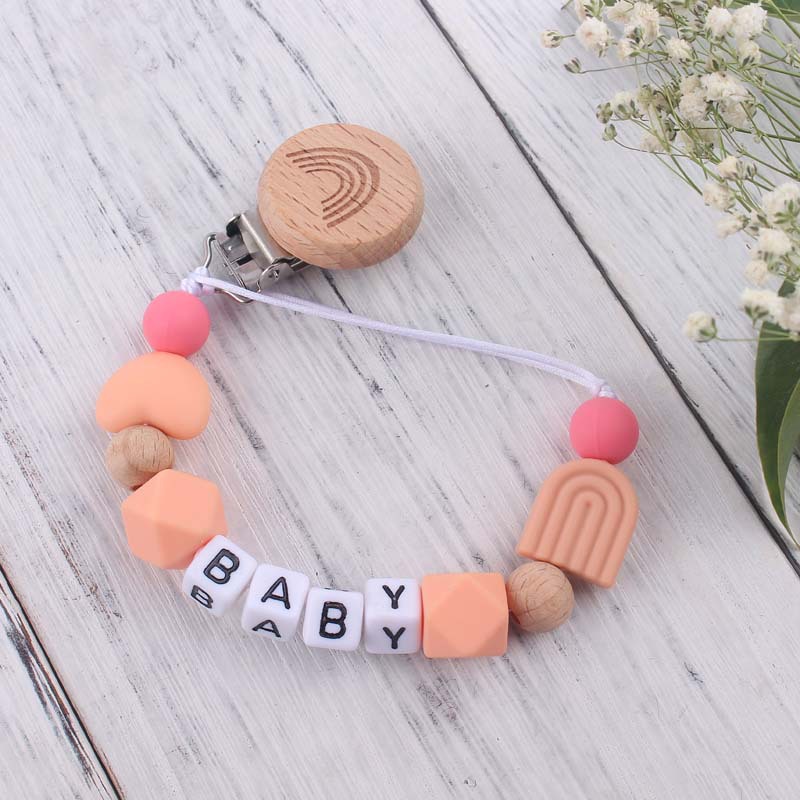 Nuevo bebé suministros de dibujos animados Arco Iris chupete clip calmante bebé Arco Iris silicona mordedura molar chupete cadena
