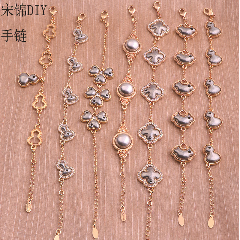 Song Jin DIY bracelet with diamond-edged gourd, four-leaf clover, and Ruyi lock base with cover, inlaid with jade and filigree accessories Song Jin DIY bracelet with diamond-edged gourd, four-leaf clover, and Ruyi lock base with cover, inlaid with jade and filigree accessories