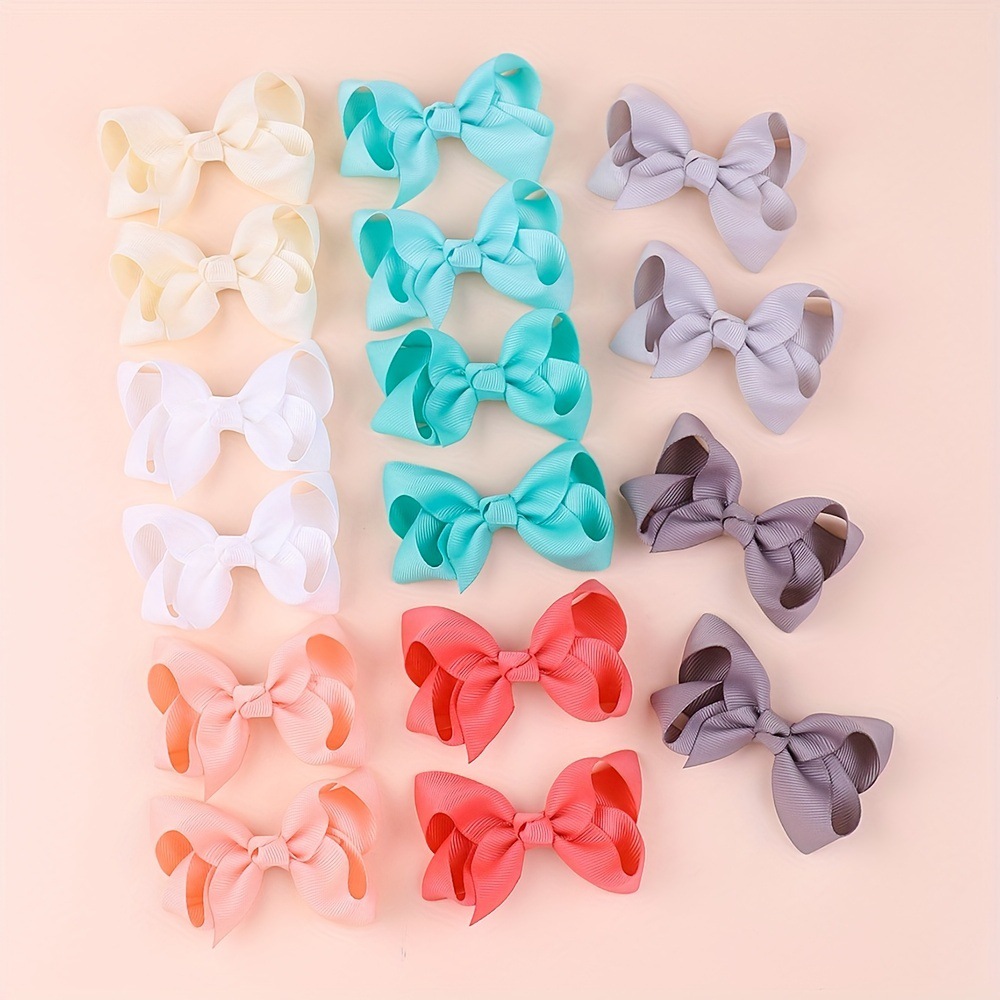 Explosiones transfronterizas clip de cabello para niños multicolor flores de arco de arco clip de boca de pato nuevo caliente venden pequeños clipes de cabello fabricantes al por mayor