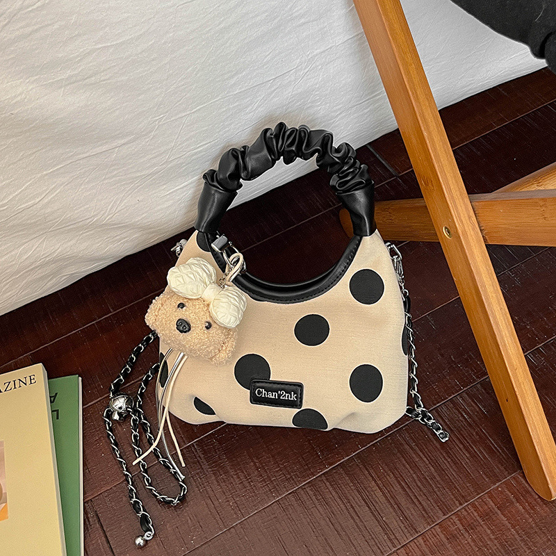 Nicho de diseño coreano bolso de brazo 2026 nuevo simple bolso de mochila diario bolso de media luna de viaje bolso de mano punto ondulado image 1