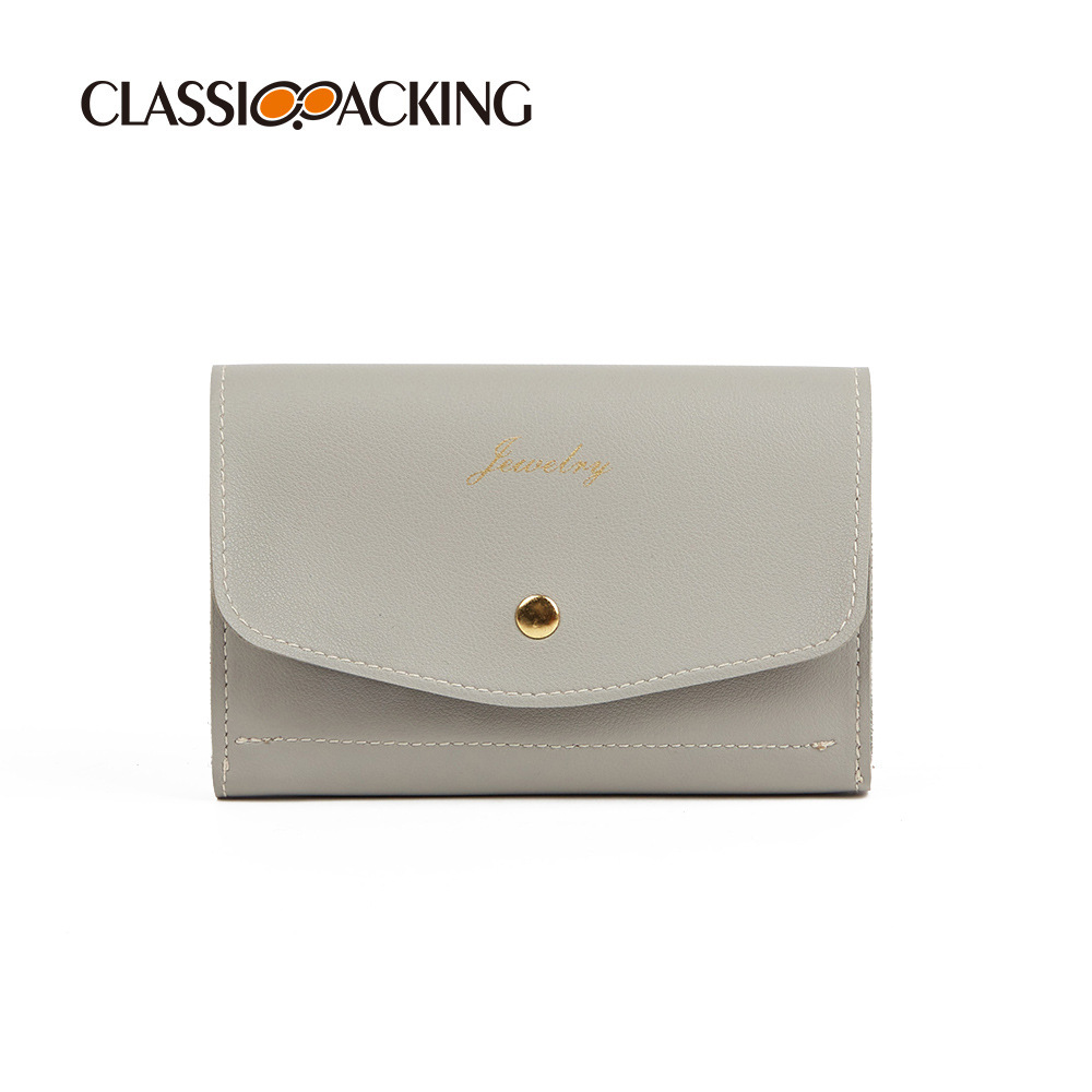 Bolsa de joyería al por mayor bolsa de almacenamiento de joyería tipo sobre plano bolsa de cosméticos de mano portátil bolsa de almacenamiento de joyería