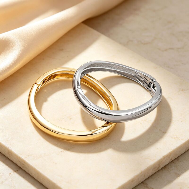 Simple, smooth, spring-loaded bracelet for women, featuring a minimalist design, a delicate spring clasp, a narrow band, a plain gold-colored cuff, and a trendy, cross-border style