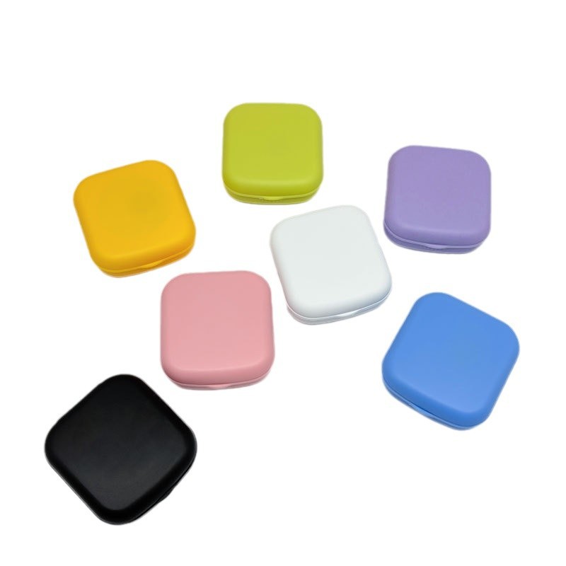Nueva caja de lentes de contacto de color caramelo con espejo, caja de lentes de contacto de belleza de color sólido pequeña y portátil, caja de cuidado de lentes de contacto