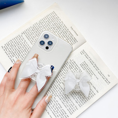 手機氣囊支架韓國ins風簡約蝴蝶結純色小眾指環扣粘貼可伸縮氣墊