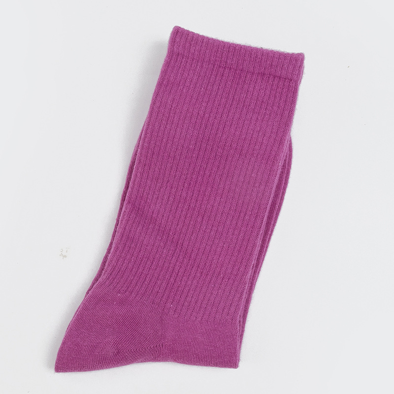 Calcetines de mujer para primavera y otoño, calcetines de algodón de color liso, versátiles y a la moda, calcetines holgados, calcetines de longitud media, calcetines deportivos que absorben el sudor, venta al por mayor.