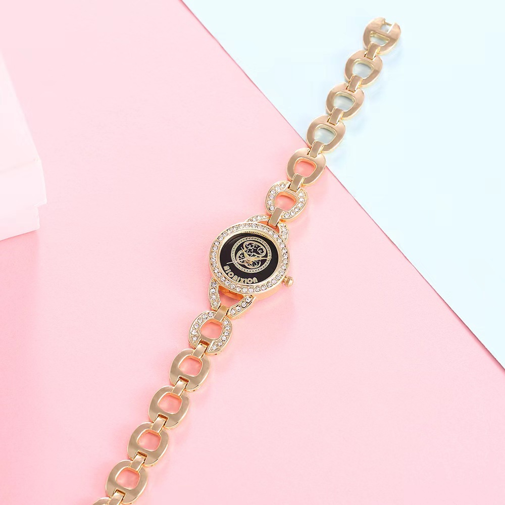 Selezionato orologio da polso versatile in oro di vendita caldo per donna con intarsio di diamanti Orologio da polso squisito di marca Orologio da studentessa con orsetto carino_voghion.com