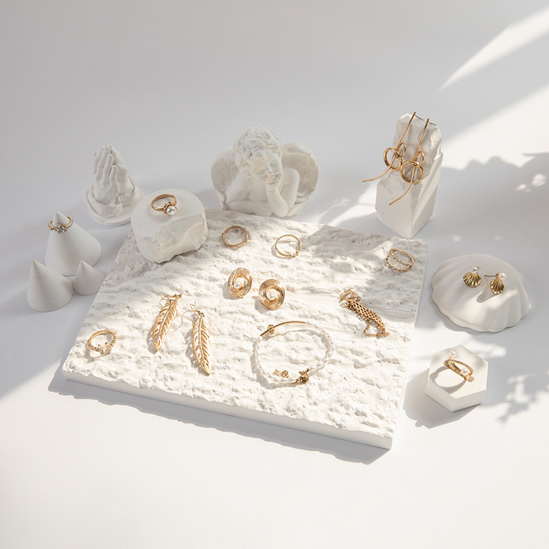 Seasonal display accessories, decorative trays, texture jewelry showcase, studio lighting photography props, earring holder