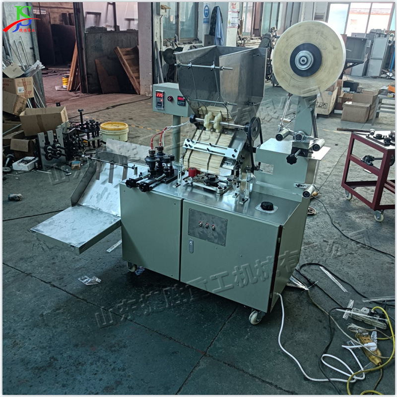 Máquina de envasado de palillos desechables Máquina automática de envasado de papel y película de plástico para palillos