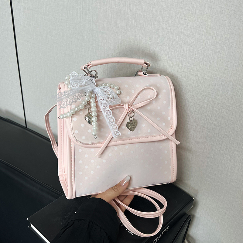 Bolsa de moda coreana lindas bajo las axilas 2026 primavera nueva bolsa de viaje simple, mochila de moda casual de alto valor.