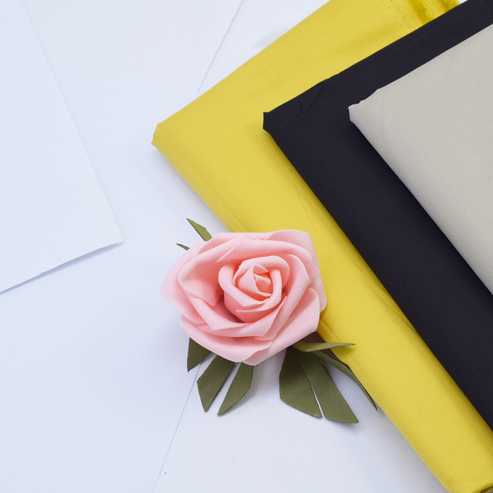 2023现货夏季弹力休闲裤面料光泽男士上衣裤子斜纹梭织布料