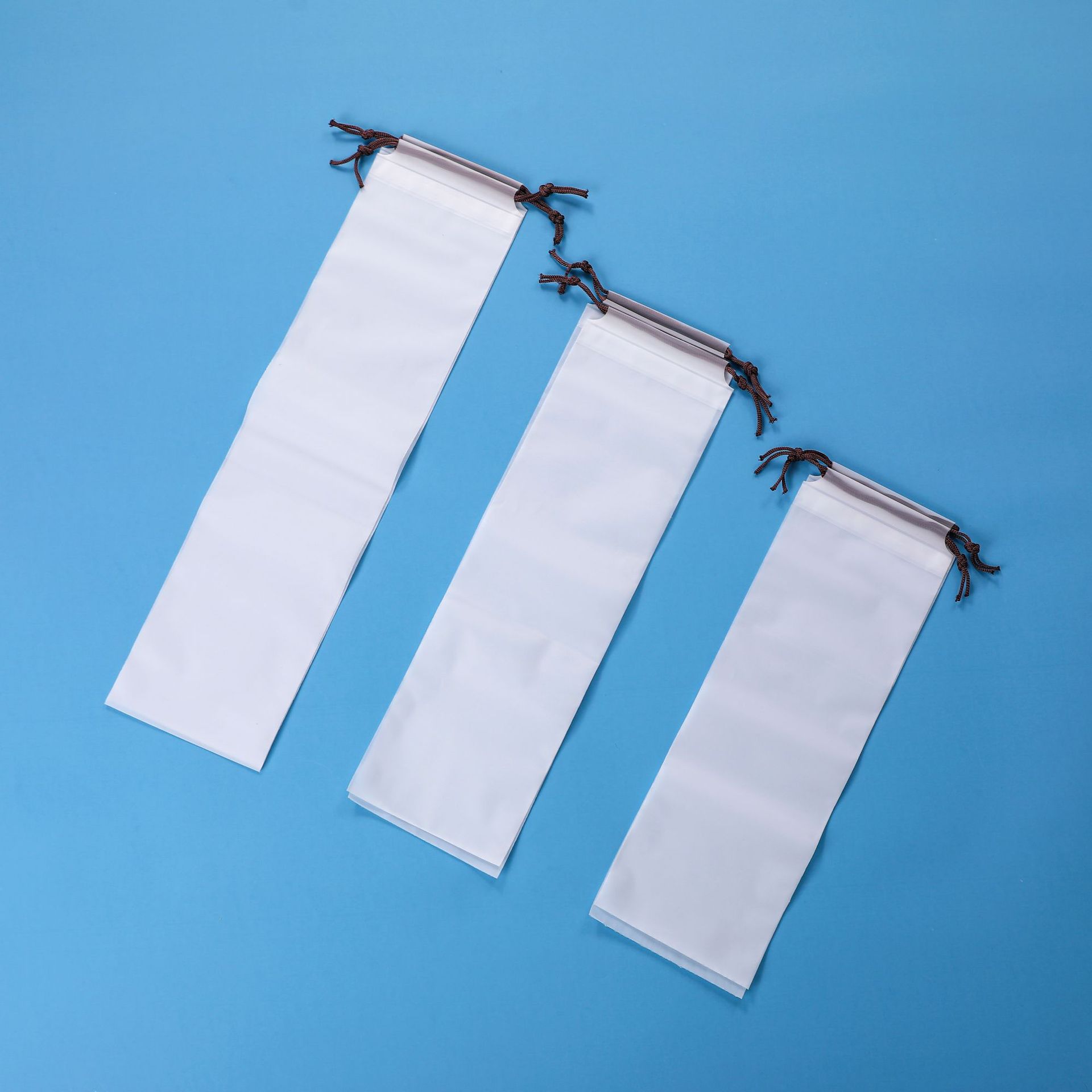 Pe bolso con cordón esmerilado al por mayor grueso ropa interior transparente calcetines zapatos ropa a prueba de polvo embalaje bolsa de almacenamiento de viaje