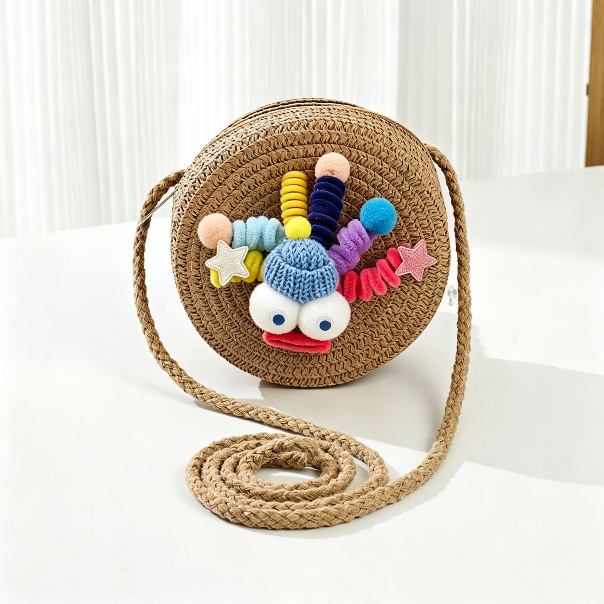 New spring and summer children's bag, big-eyed little monster round bag, baby crossbody bag, beach straw woven small shoulder bag