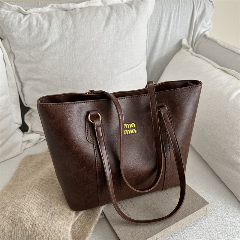 Bolsa de hombro de viaje retro de alto nivel, mujer, invierno 2024, nueva bolsa de mujer de trabajo, moda de bolsas Toto este año.