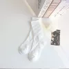 White, with embroidery