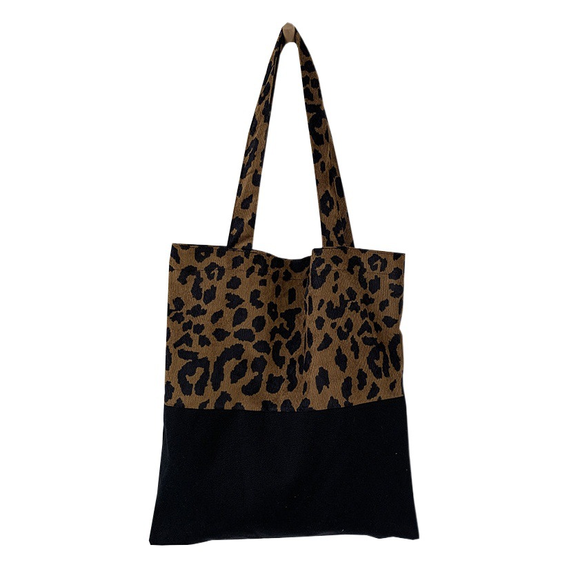 Otoño e Invierno nuevo estampado de leopardo bolsa de lona de las mujeres de hombro de gran capacidad de diseño artístico ins bolsa estudiante bolsa de clase