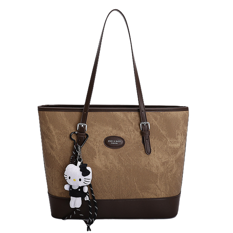 2025 invierno nuevo retro nicho Volkswagen bolso de mano de gran capacidad bolso de hombro de viaje de mujer bolso de brazo de moda versátil bolso de brazo