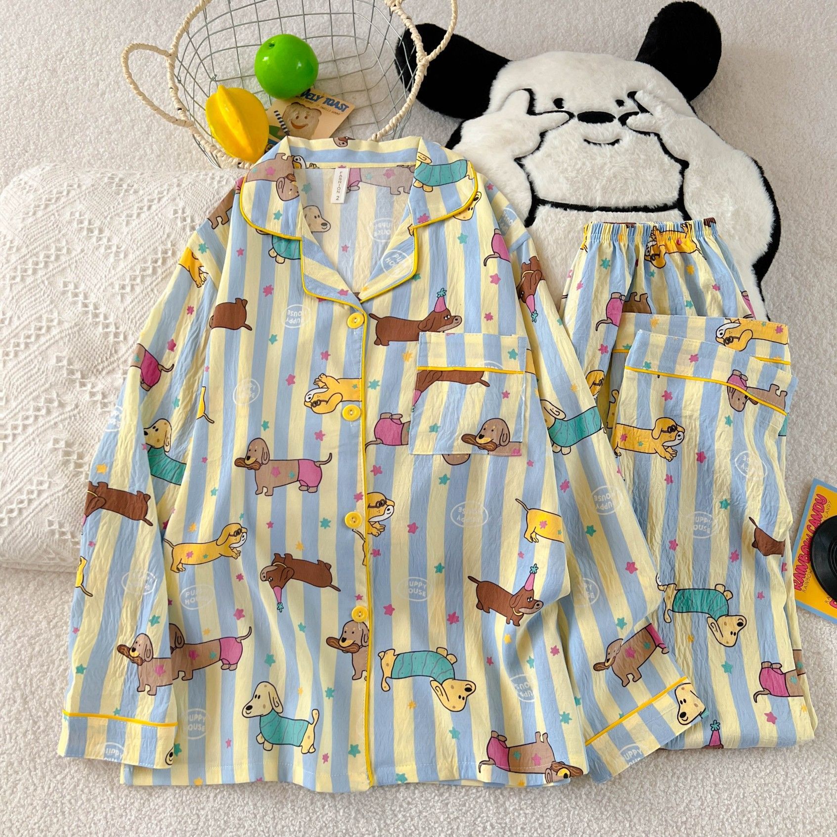 Al por mayor transfronterizo KT gato pijama mujer primavera y otoño nubes algodón manga larga 2026 nuevo juego de ropa de hogar encantadora super caliente