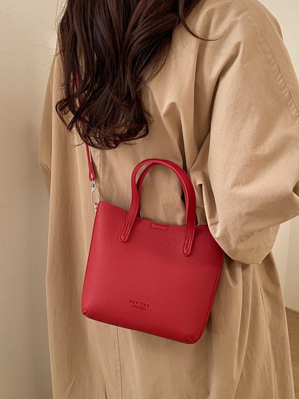 2026 nueva moda de un hombro mochila retro gran capacidad ligera de lujo simple viaje bolsa de cubo de textura bolsa madre