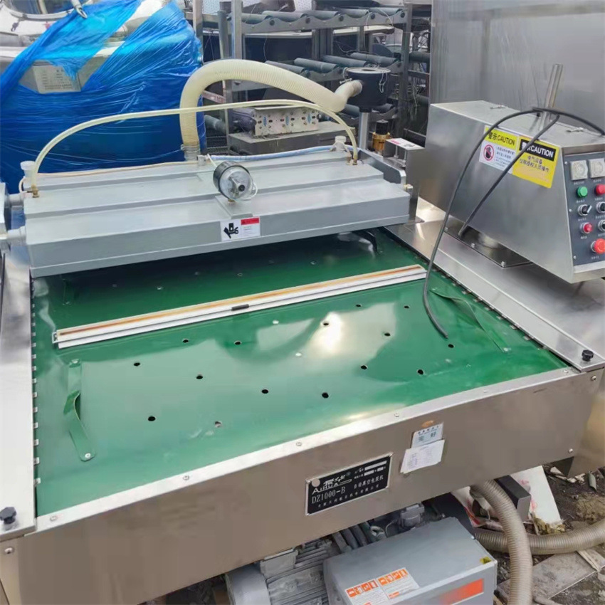 供应连续式滚动真空包装机 食品酱菜封口真空包装机 香肠包装机