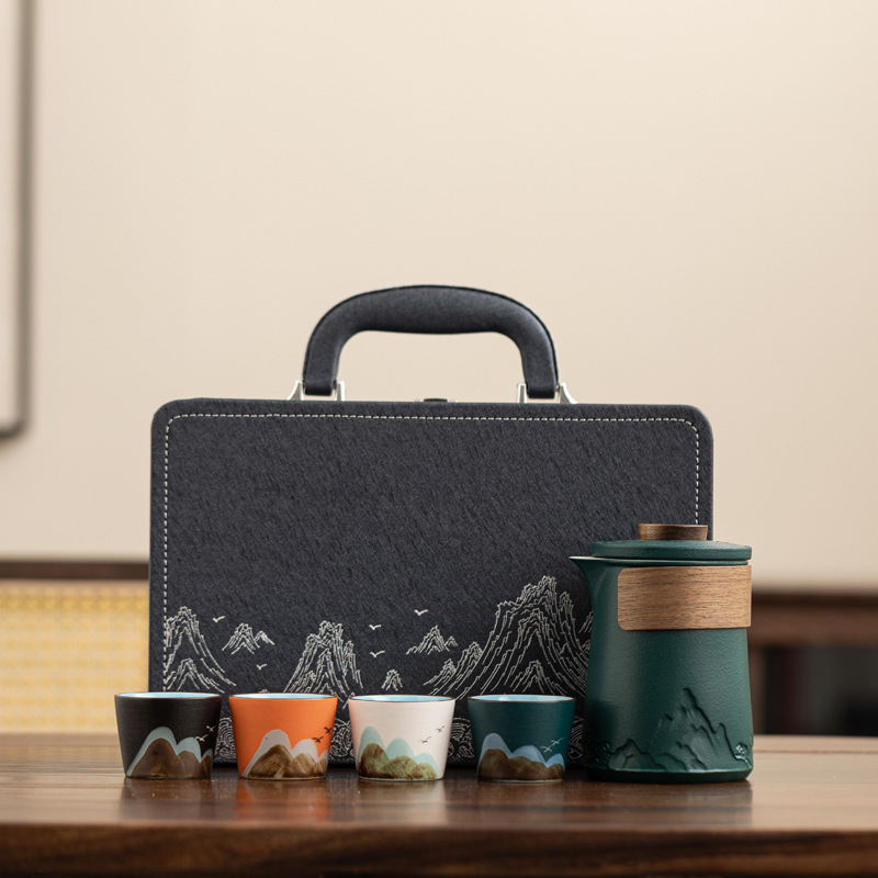 Conjunto de té de viaje de cerámica de estilo chino regalos de negocios de talla de taza de marca regalo de mano de empresa estatal bienestar