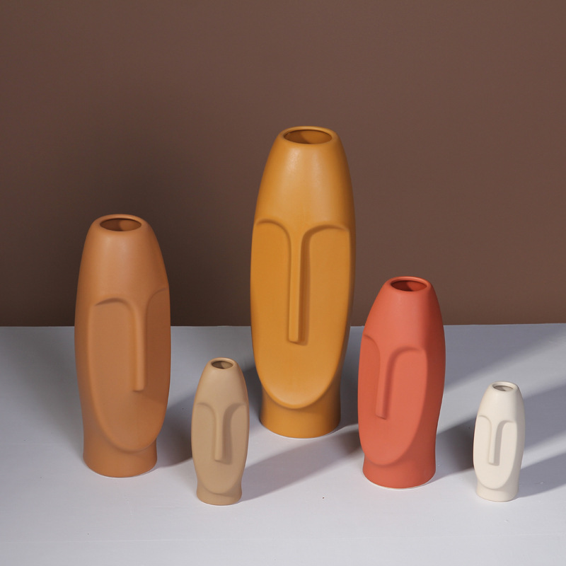 Estilo nórdico creativo colorido cara florero de cerámica decoración del hogar Decoración suave sala de estar decoración de la habitación modelo