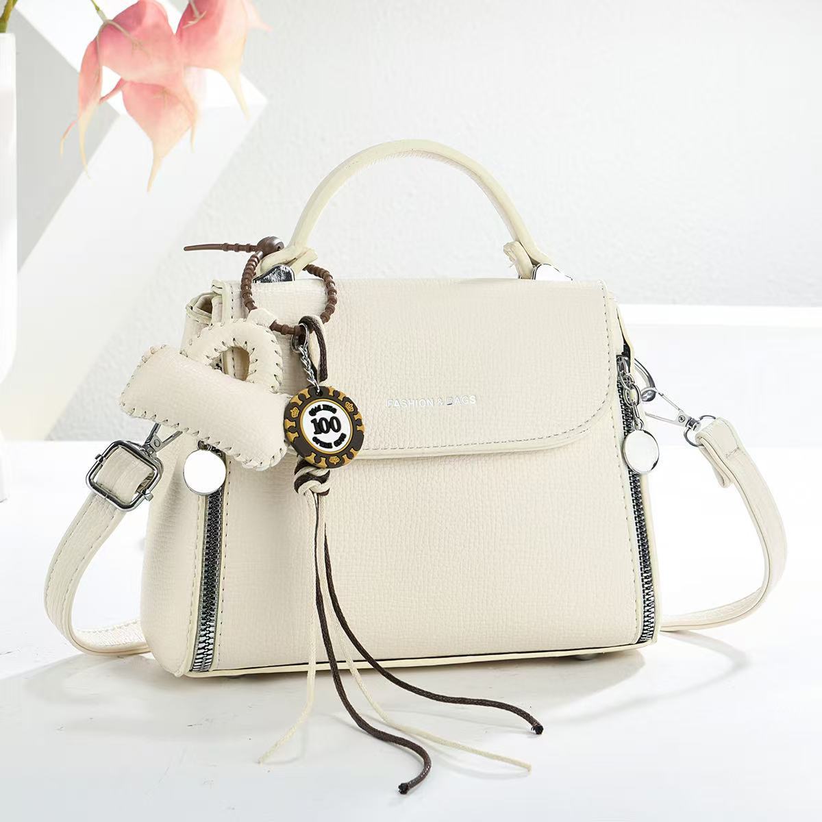 Bolsas de textura universal bolsas de mano colgantes bolsas de mano de transporte diario bolsas de hombro de moda casuales bolsas transfronterizas