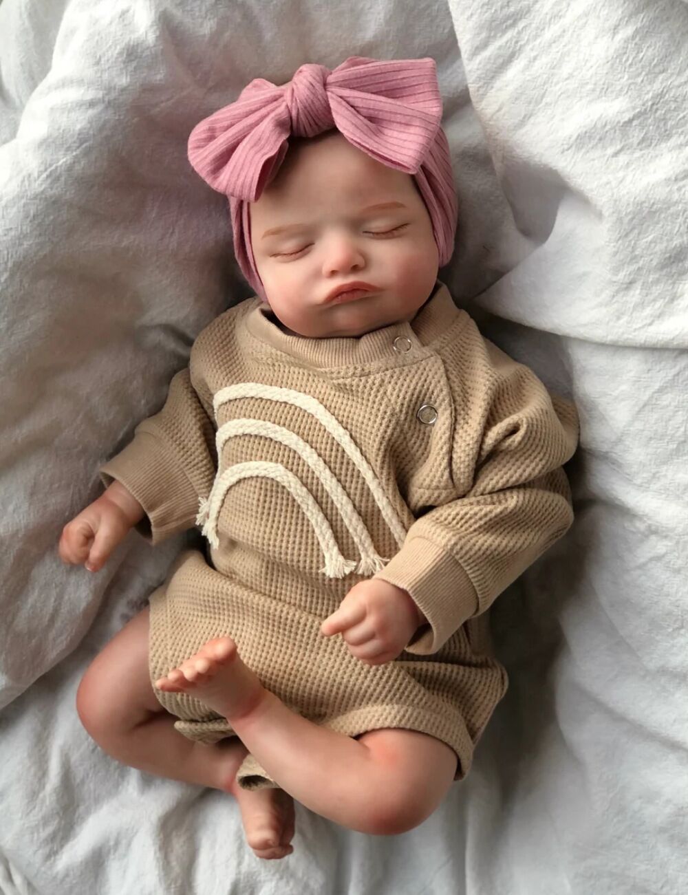 Como se muestra en la imagen de la muñeca