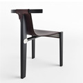 北欧现代设计师创意异形成人三角椅马鞍皮实木简约家用休闲椅餐椅