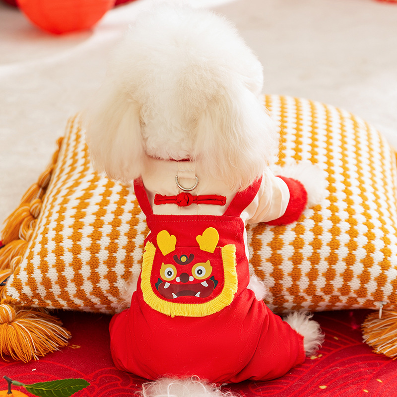 Otoño y invierno perros gruesos cinturones calientes despertar leones de Año Nuevo ropa de algodón de cuatro patas gato Tang vestido festivo ropa de perro mascota