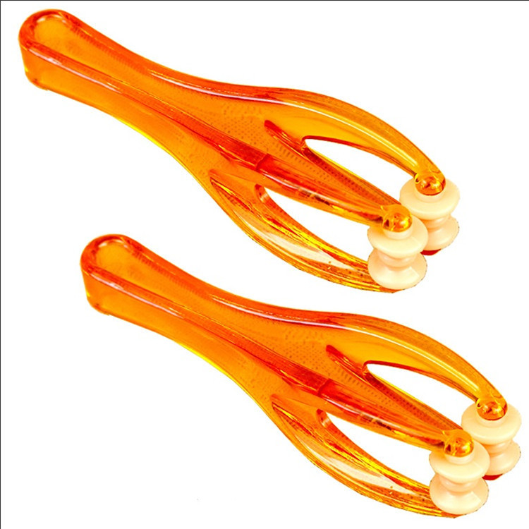 Spot al por mayor masajeador de dedos, rodillo de acupuntura para articulaciones, masaje de manos hermosas, clip de masaje de pulgar, regalo creativo