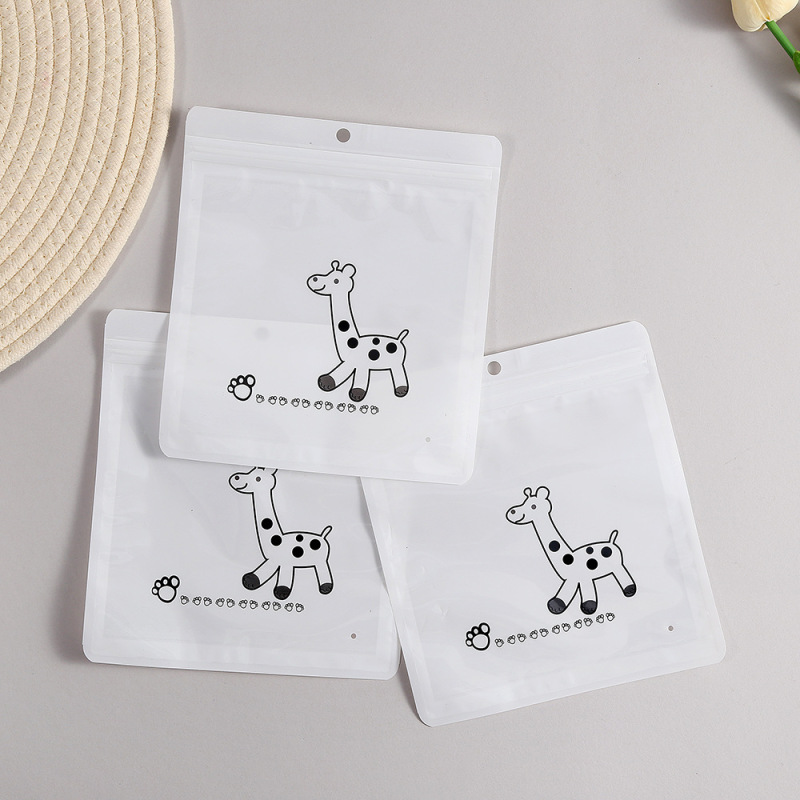 PEプラスチック製の自封袋、厚手の透明な靴下用汎用包装袋、キリンの漫画柄衣類袋、越境向け|undefined