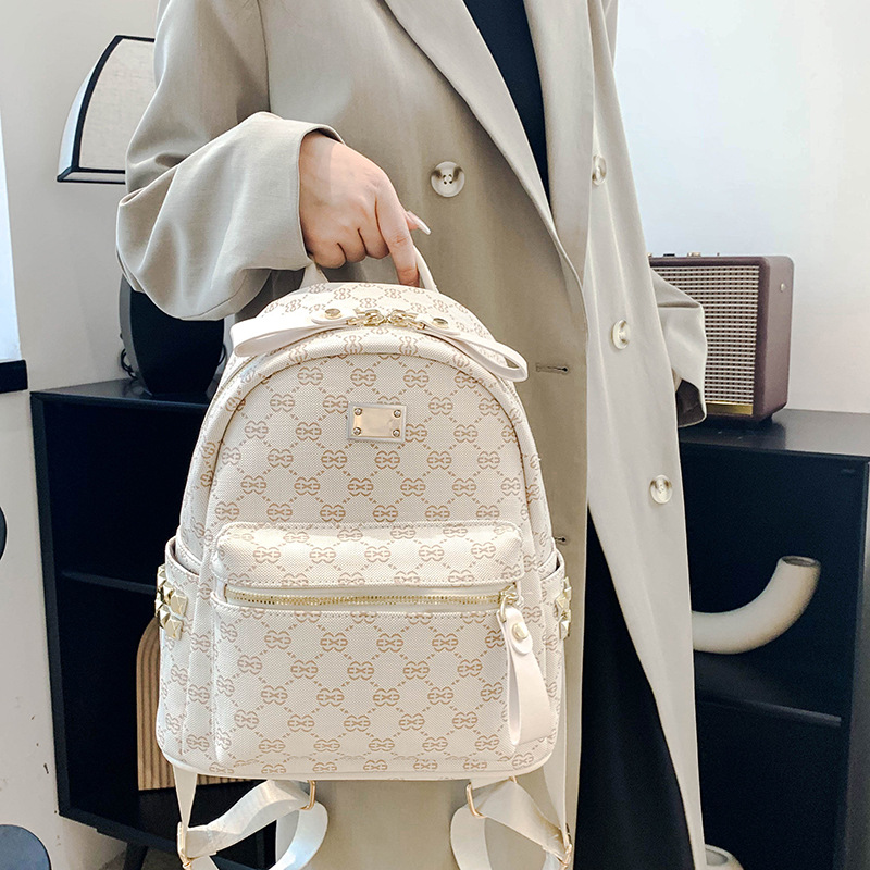 Mochila de fábrica para mujer 2023 nueva moda de verano estilo coreano moda de mujer mochila de gran capacidad bolsa pequeña de viaje para mujer