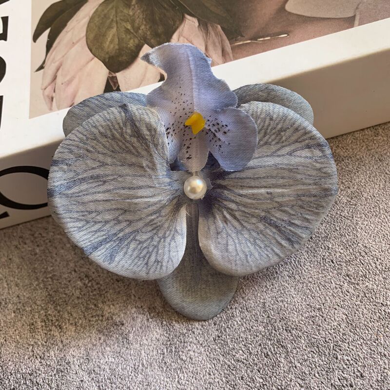 絹布の胡蝶蘭の花の頭は花の壁の部品の花の材料の頭をシミュレーションして髪を飾ってdiyの手作りの結婚祝いの贈り物を挟んで造花を飾ります。|undefined