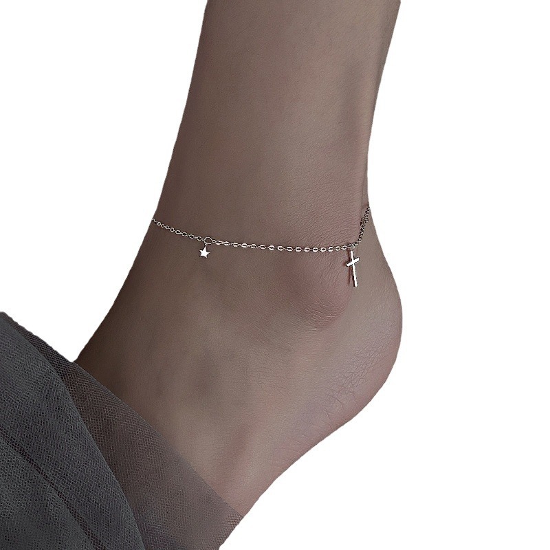 Joyería de plata nueva S925 plata esterlina tobillera para niñas de alto grado sentido nicho diseño luz lujo borla Cruz pierna decoración para damas