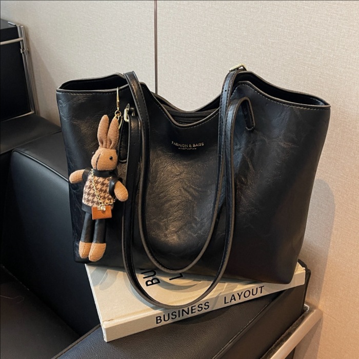 Bolsa de mano transfronteriza simple para mujeres 2025, otoño y invierno nuevo bolso de mano retro de gran capacidad para viajar bolso de hombro axilar image 1
