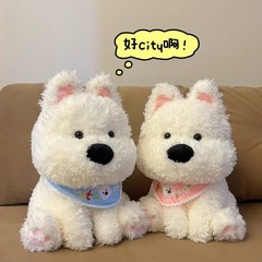 西高地の子犬のぬいぐるみのぬいぐるみの子供は寝ています。