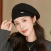 Knitted black beret