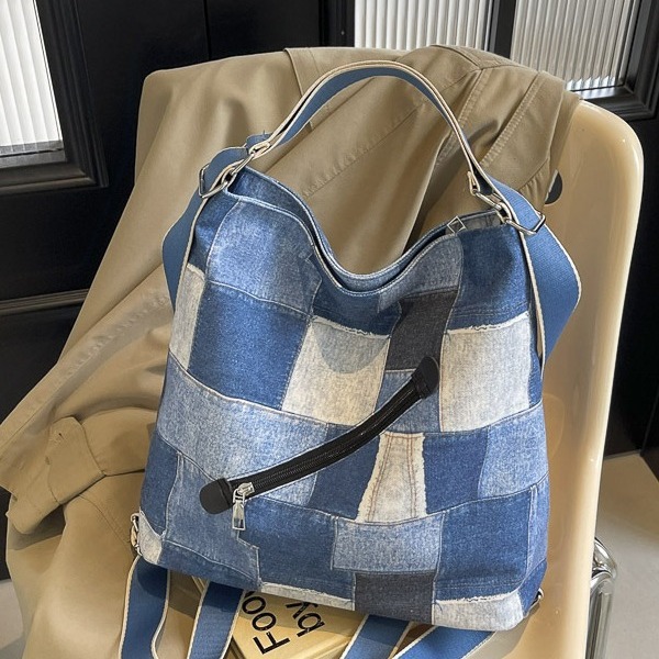 Mochila con sentido de diseño, bolso de nicho, correa de hombro ancha para mujer, bolso de mezclilla de gran capacidad, bolso de mensajero de un solo hombro, mochila multiusos